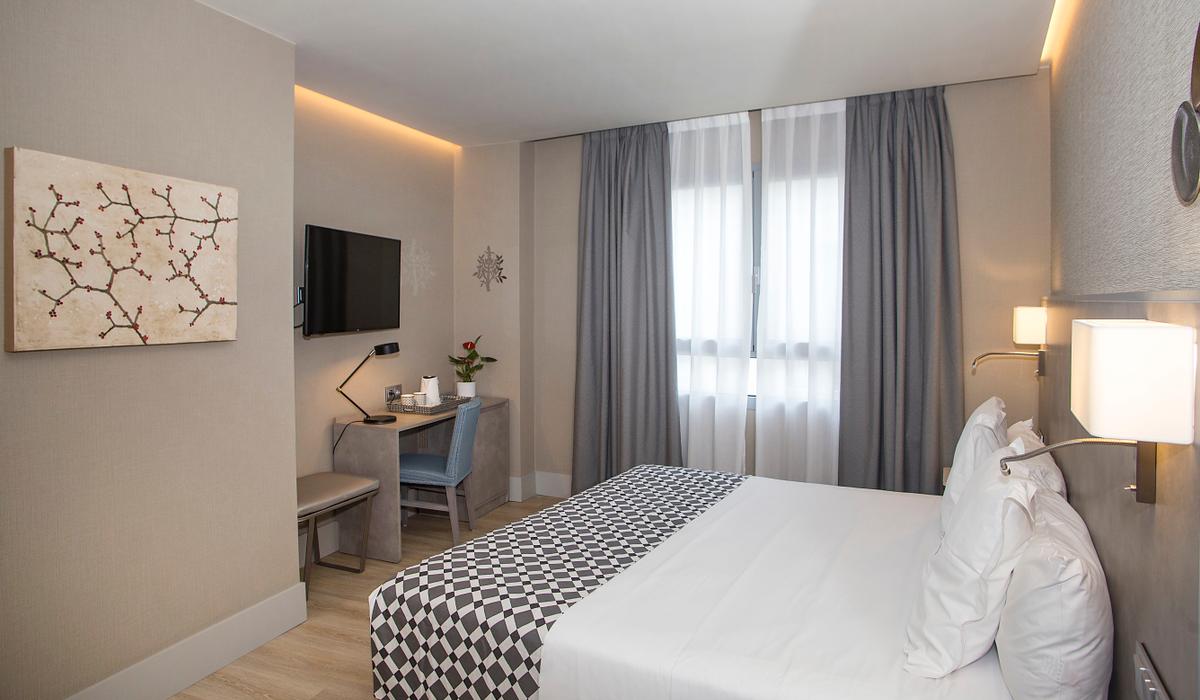 Habitación Triple Hotel América Sevilla Habitación Triple Hotel América Sevilla