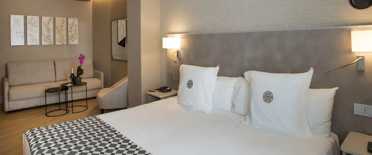 Habitación Junior Suite Hotel América Sevilla Habitación Junior Suite Hotel América Sevilla
